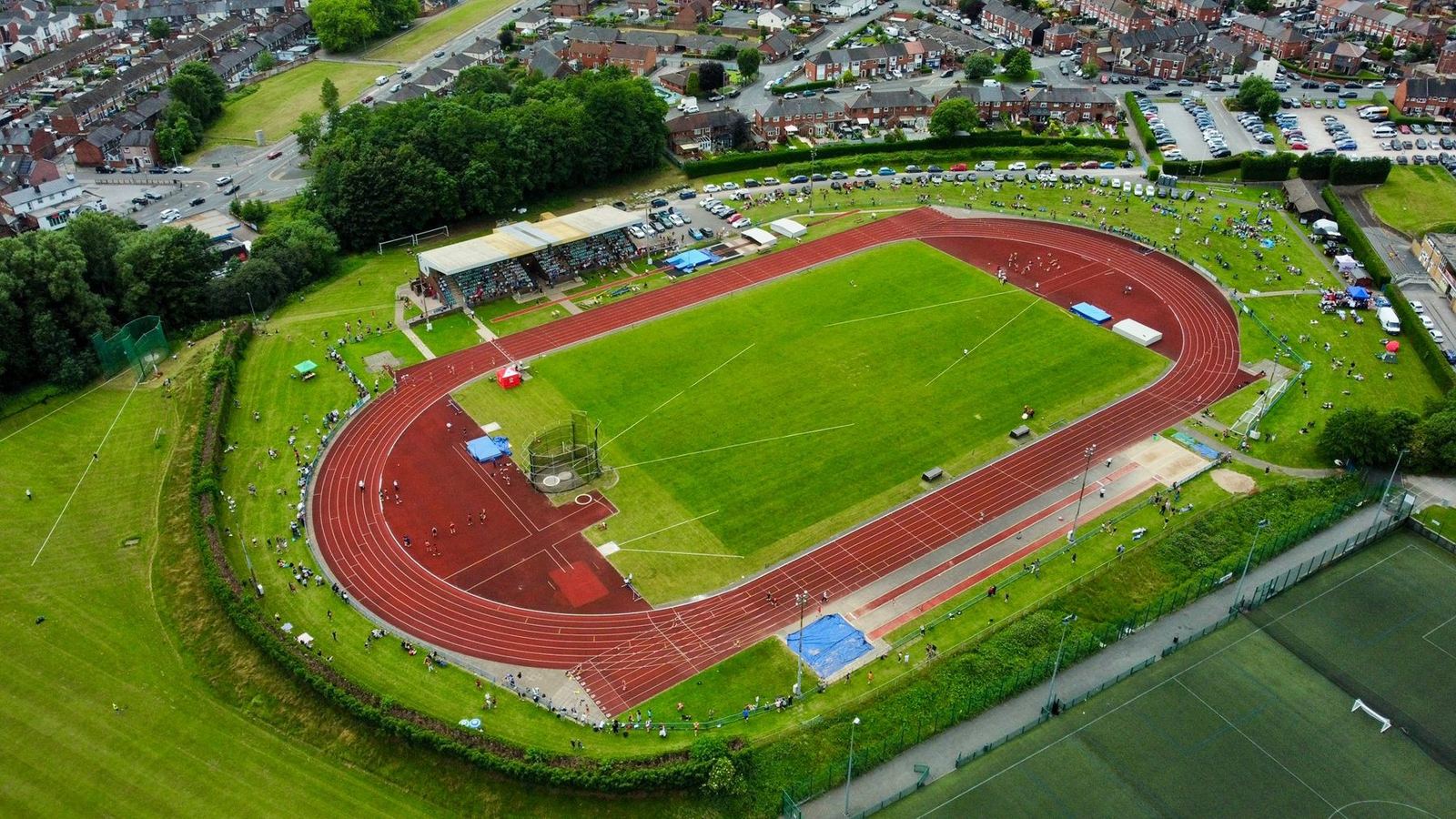 Aerial view of Northwood Stadium: the track, grandstand and pitches